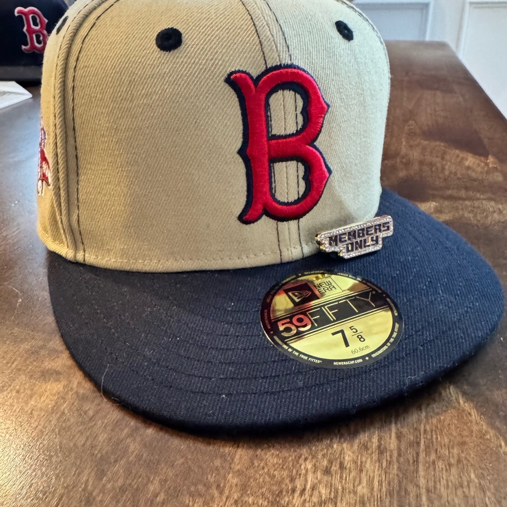 New Era Blue  and tan” fitted hat 
With Green under ,